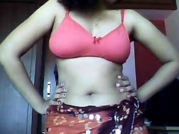 Hot Indian bhabhi changing her pink bra while live cam was on